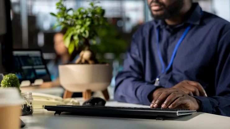 A businessman reviewing over documents in an office — an article about e-commerce SEO Nigeria