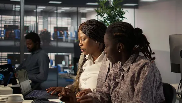A manager working in an office — an article about technology budget for Nigerian SMEs