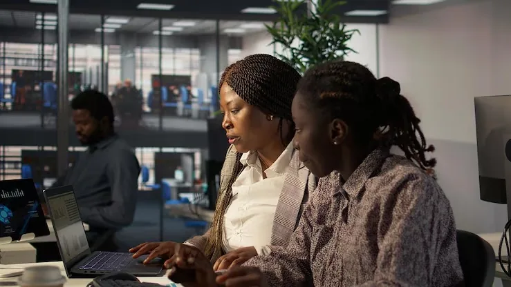 A manager working in an office — an article about technology budget for Nigerian SMEs