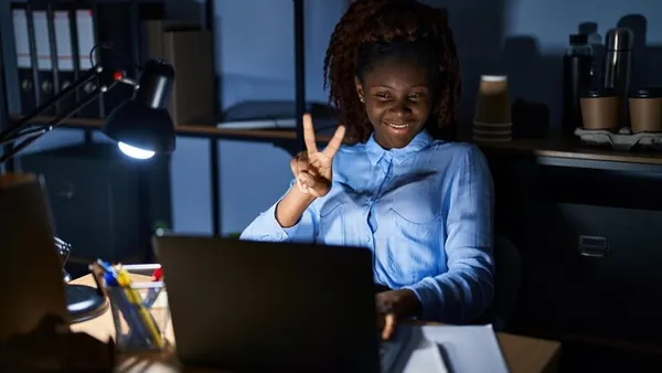 An African businesswoman working in an office — an article about website design for Nigerian personal brands