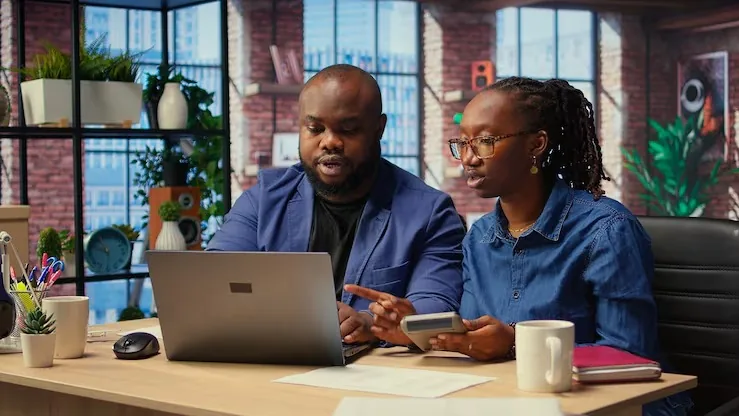 African couple at home — an article about website development for importers and exporters in Nigeria