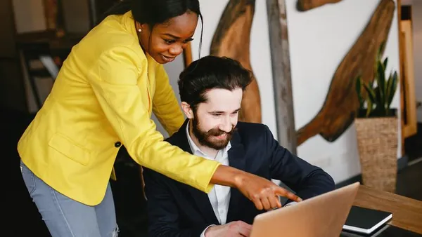 A businessman working in an office — an article about website development for Nigerian insurance companies