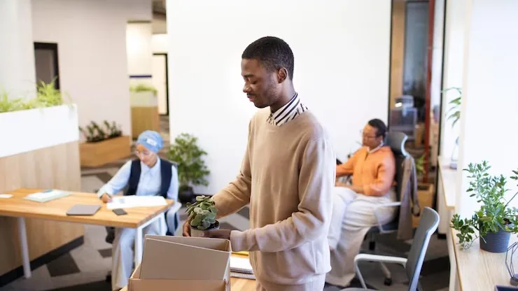 A businessman working in an office — an article about website vs marketplace