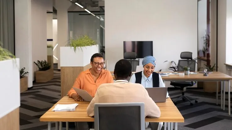 A businessman in a meeting in an office — an article about website development contract
