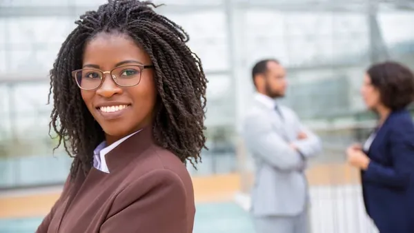 A businesswoman working in an office — why cheap app development costs more