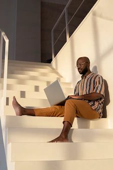 Founder reviewing a new app on a laptop